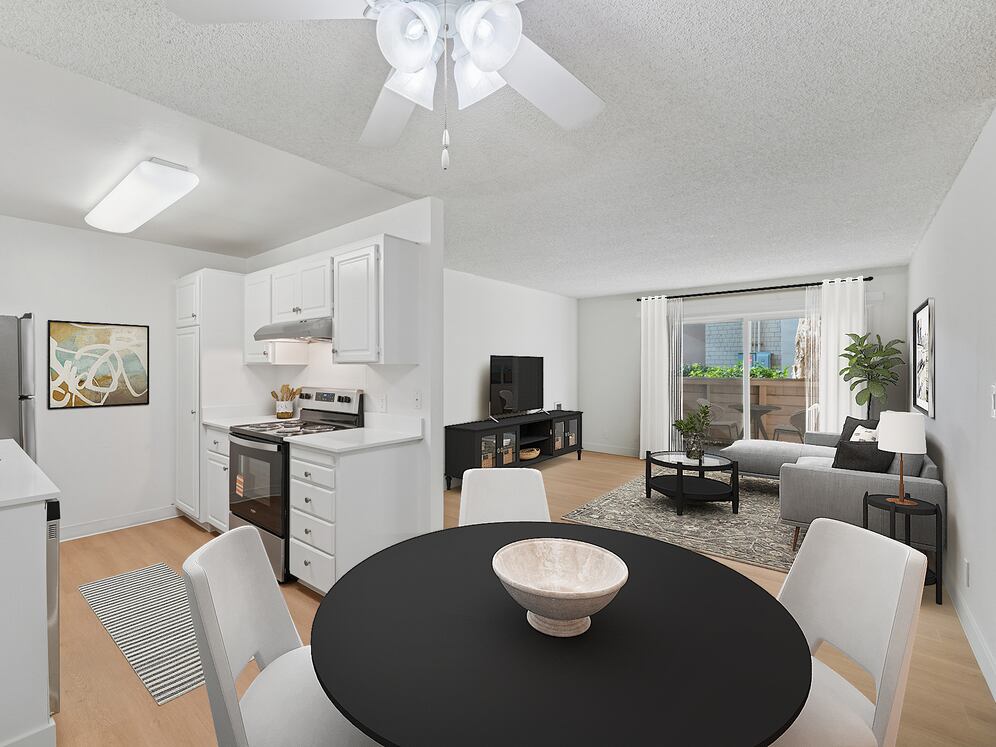 Renovated Package I kitchen, living, and dining area with hard surface flooring