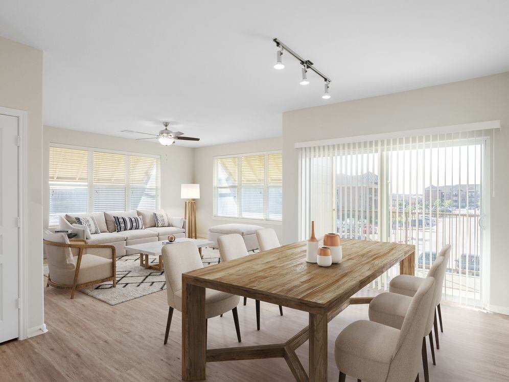 Dining and living room with hard surface vinyl plank flooring