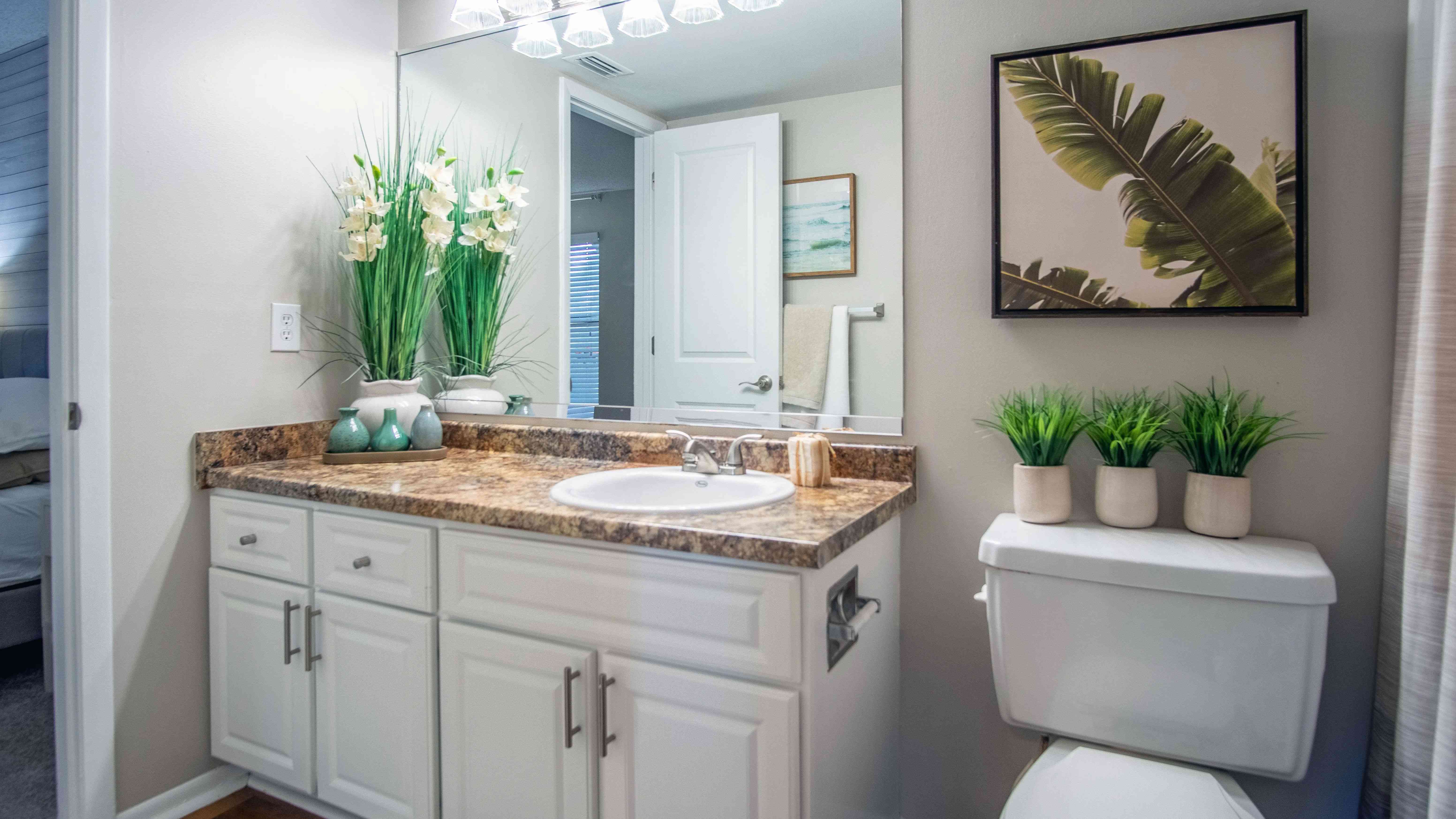 Discover the spaciousness and functionality of guest bathrooms, designed with generous counter space and dual entrances for added convenience. 