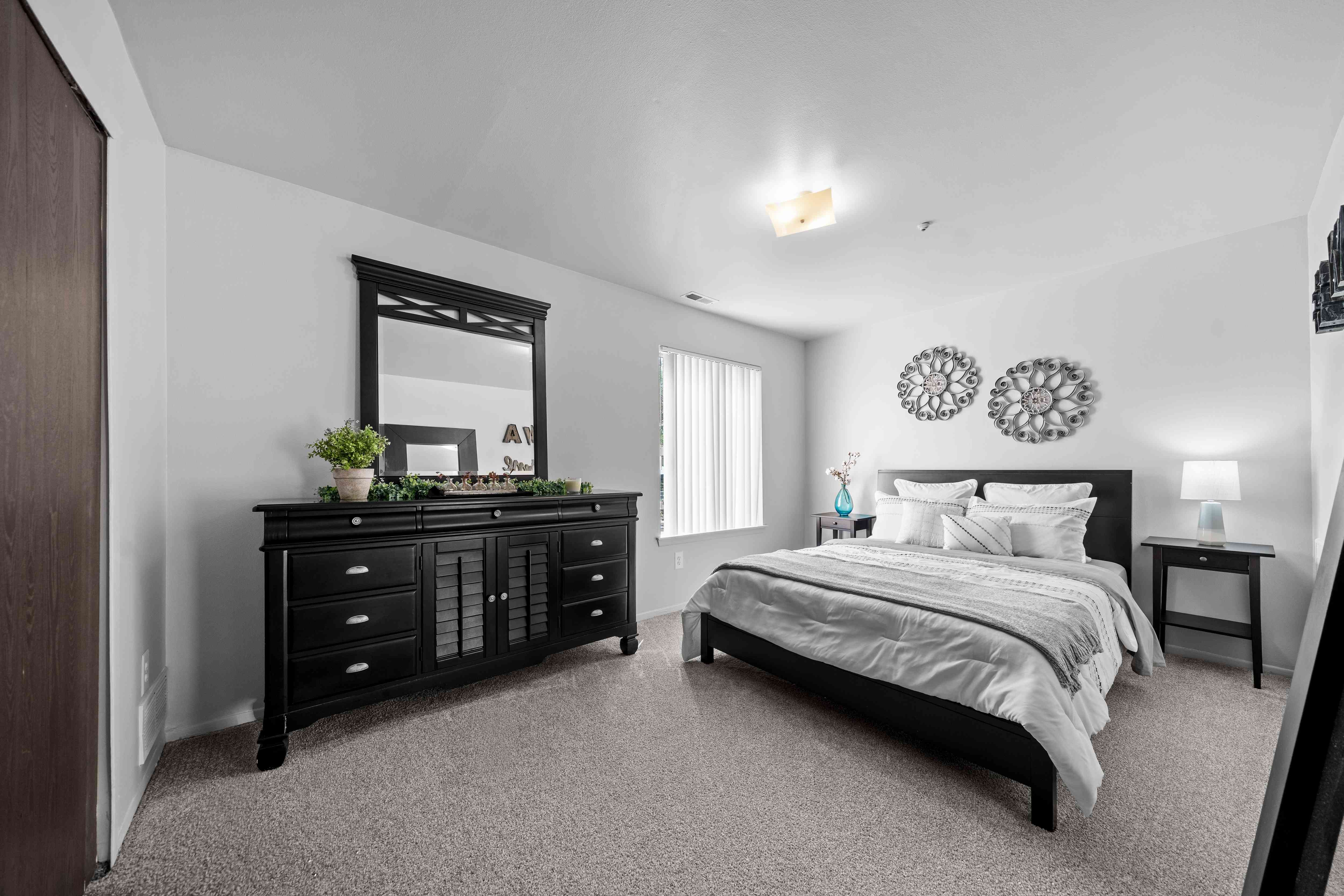 Big bedroom with natural lighting at Westwood Village Apartments in Westland, MI