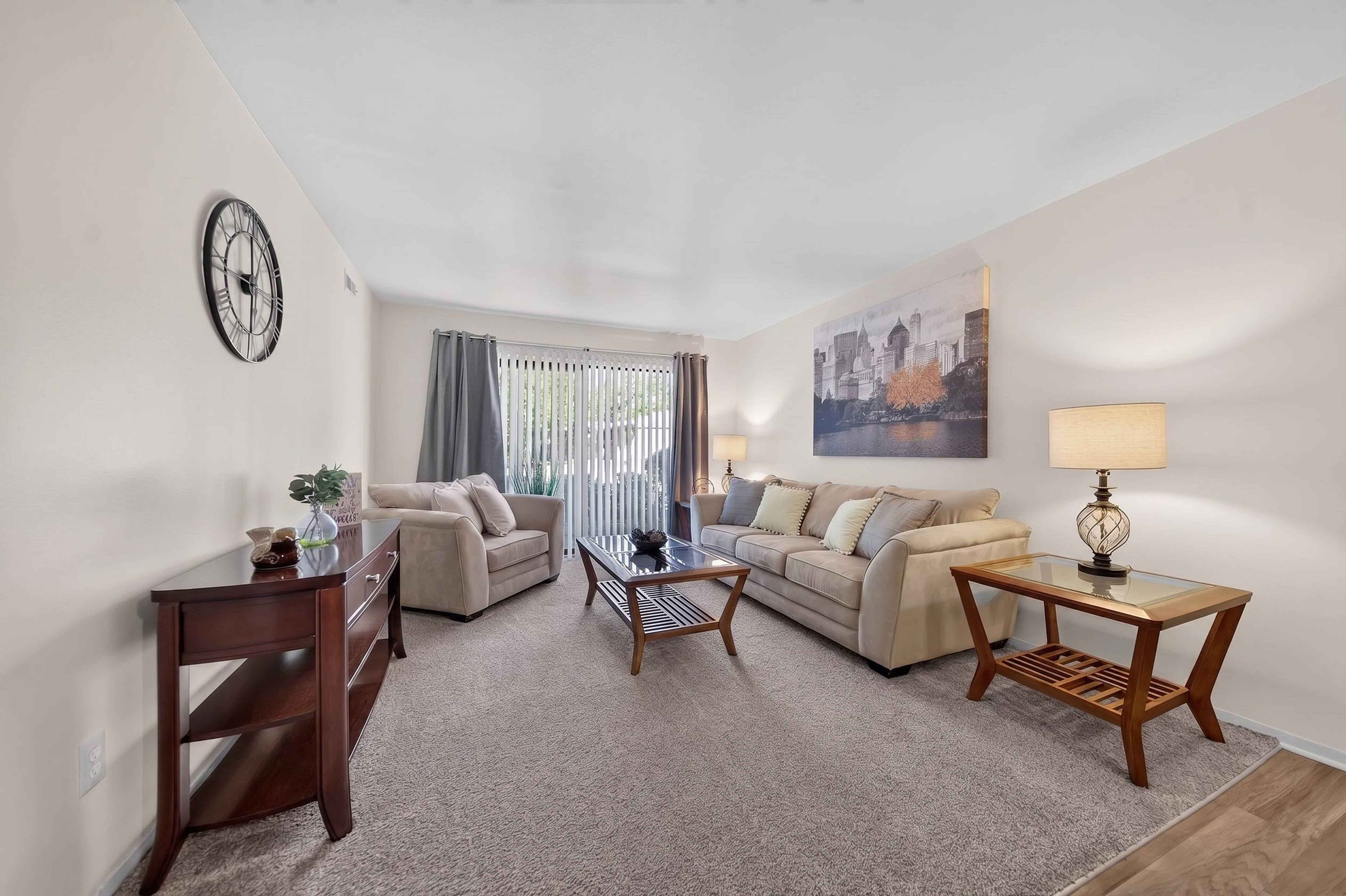 Cozy living room at Eastwood Village Apartments in Clinton Township, MI.