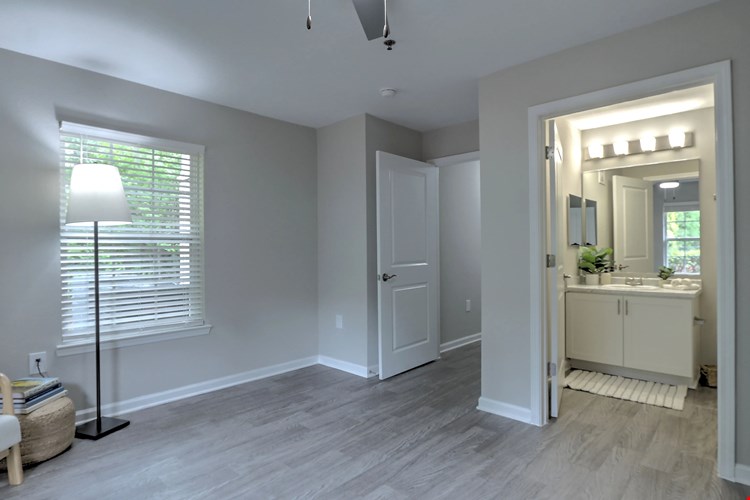 Luxe primary suite with adjoining bathroom for your own private haven.