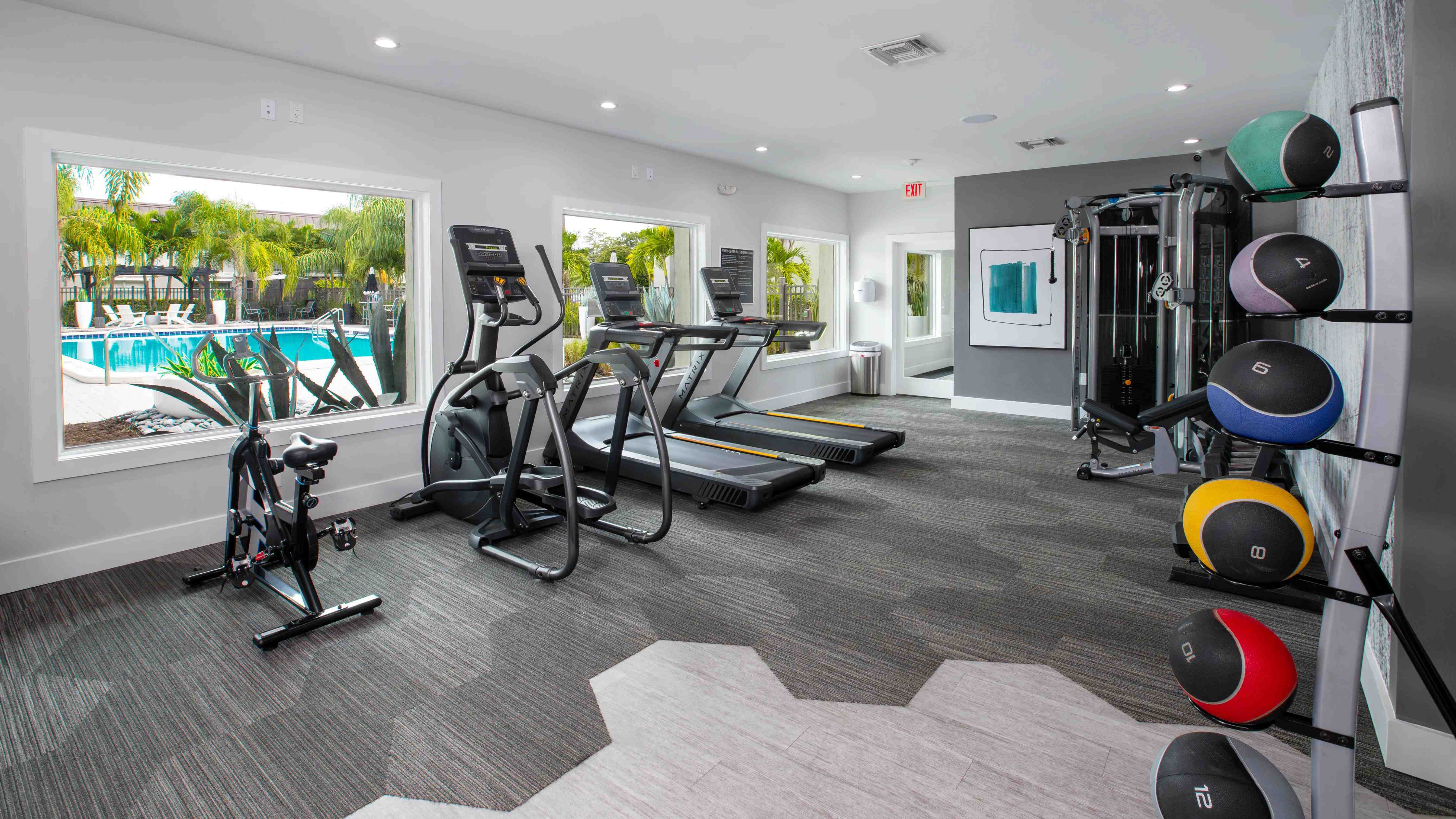Stay active anytime in our 24-hour fitness center featuring state-of-the-art equipment and scenic pool views, providing a motivating and convenient space for your workout, day or night.