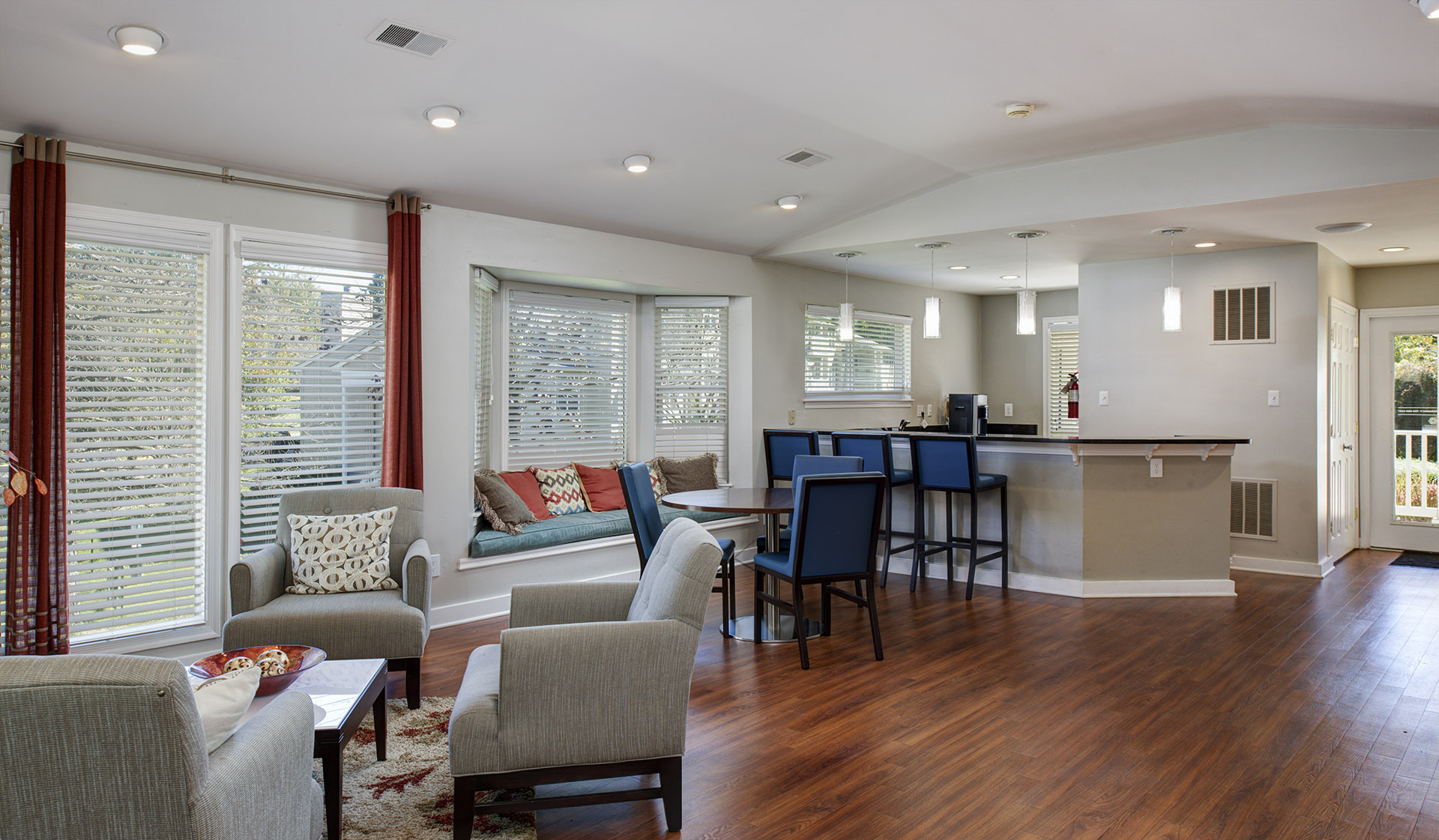 Clubhouse features a kitchen, fireplace, and ample seating