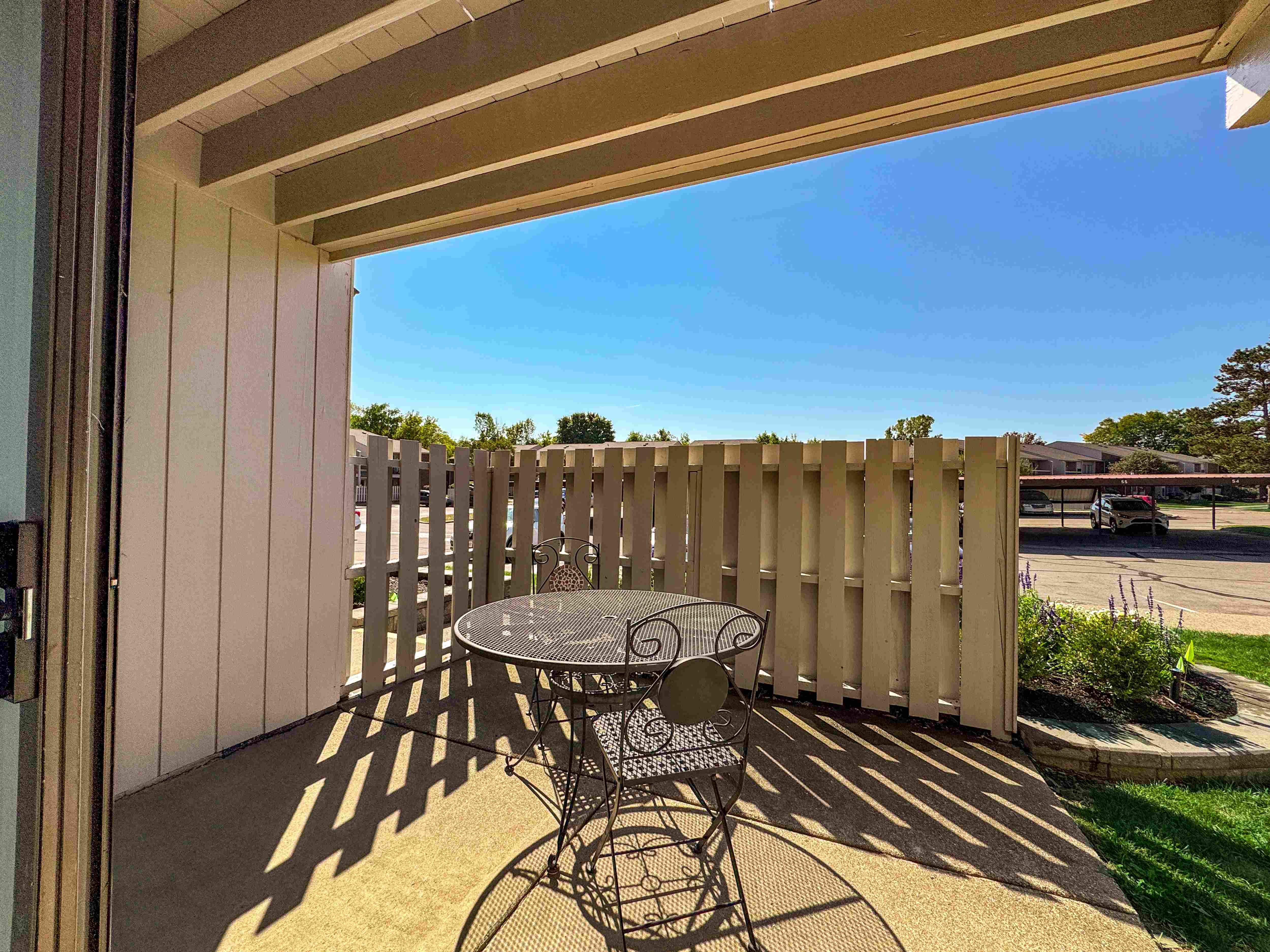 Roomy patio at Three Oaks Apartments in Troy, MI