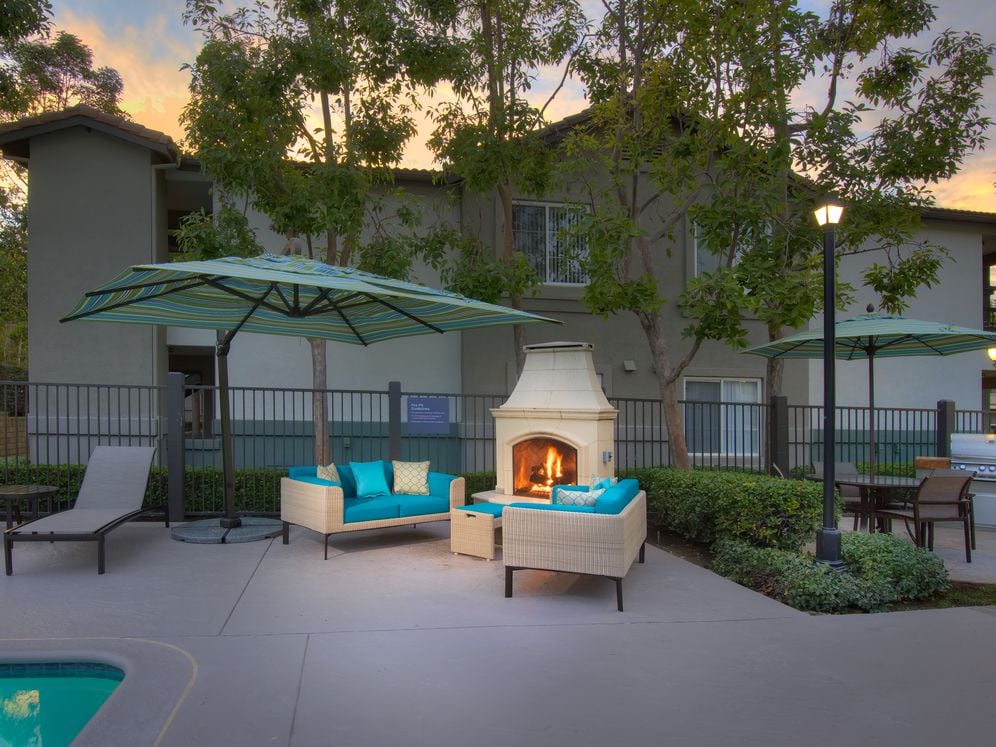 Swimming Pool With Lounge Seating with Fireplace