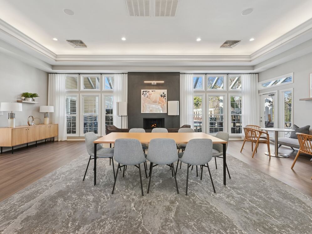 Resident lounge with fireplace and seating