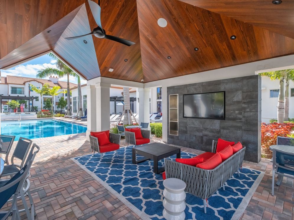 West Phase outdoor lounge with TV and seating areas