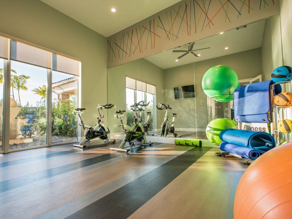 Fitness studio with spin bikes and stretching area