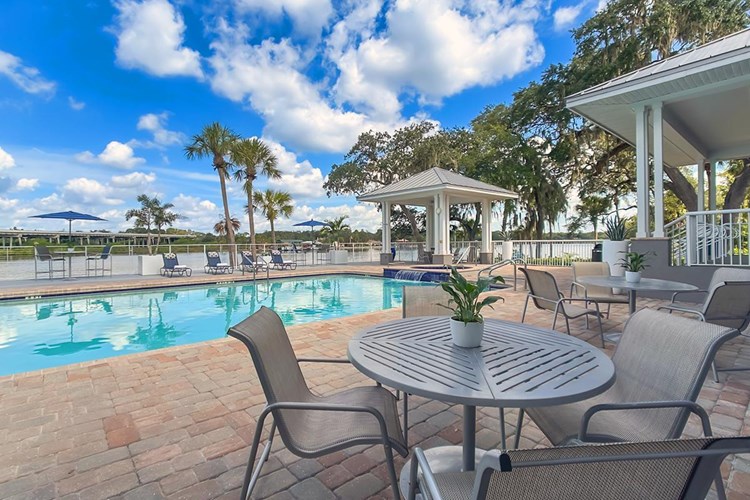 Enjoy the beautiful lake view from our poolside seating.