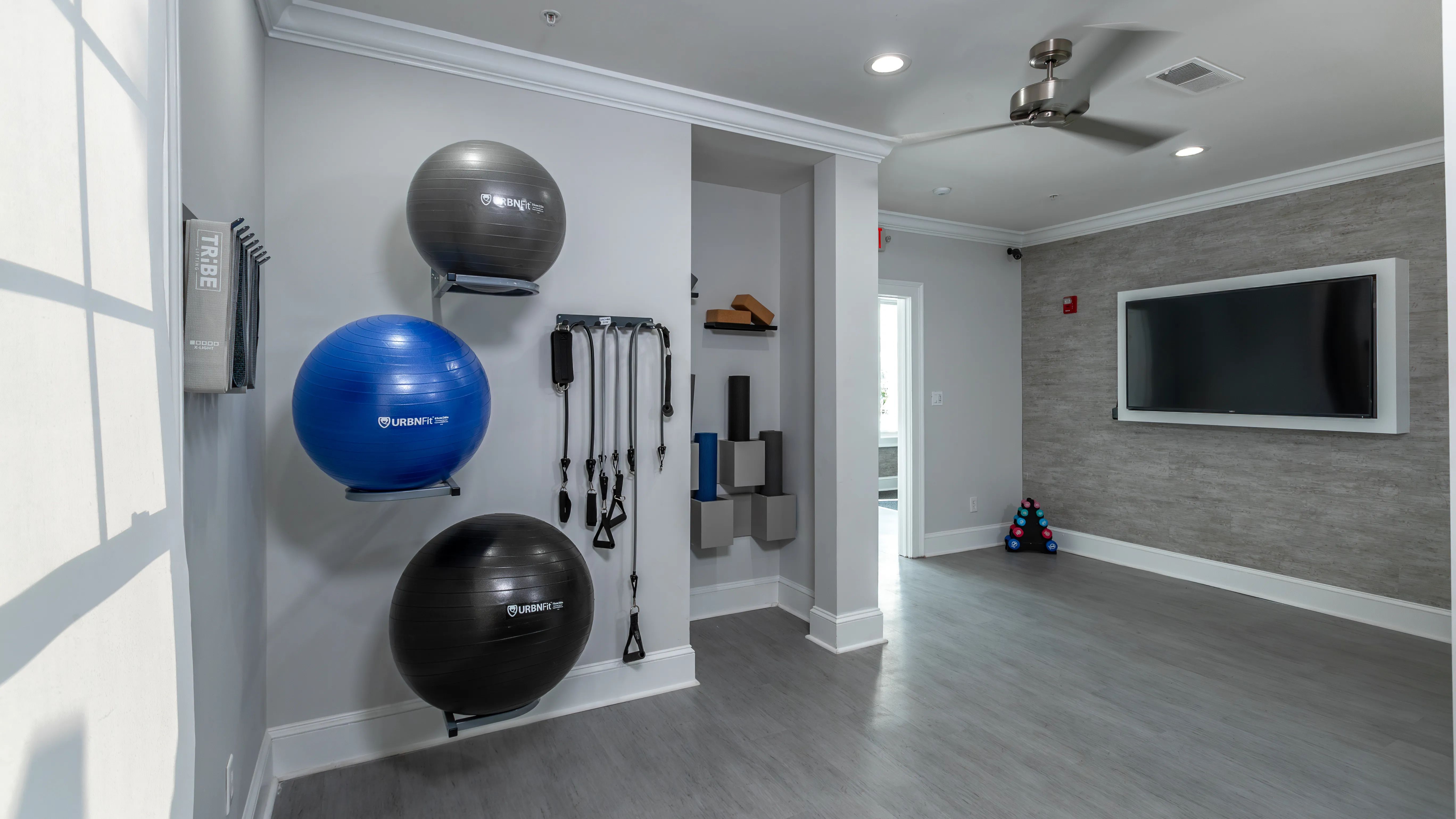 Unwind in our new yoga studio equipped with a variety of yoga and stretching gear. 