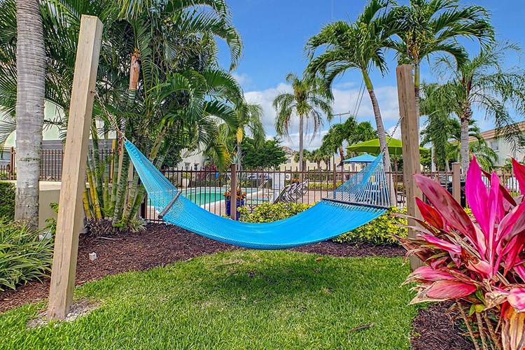 Soak in the sun from our hammock garden.