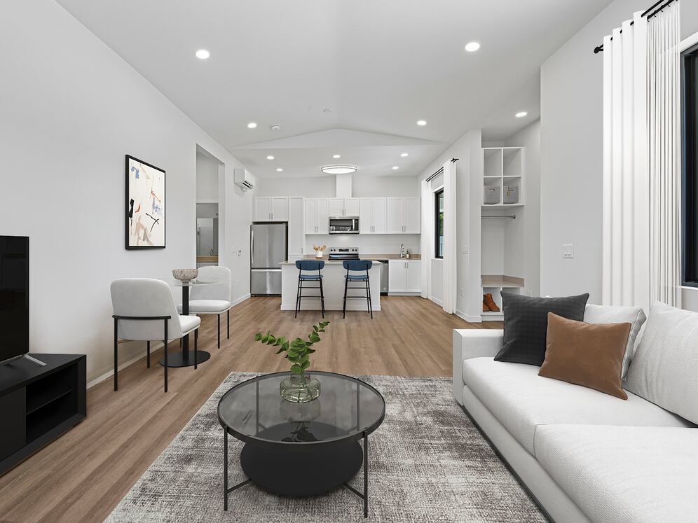 Freestanding Home dining and living room with hard-surface flooring