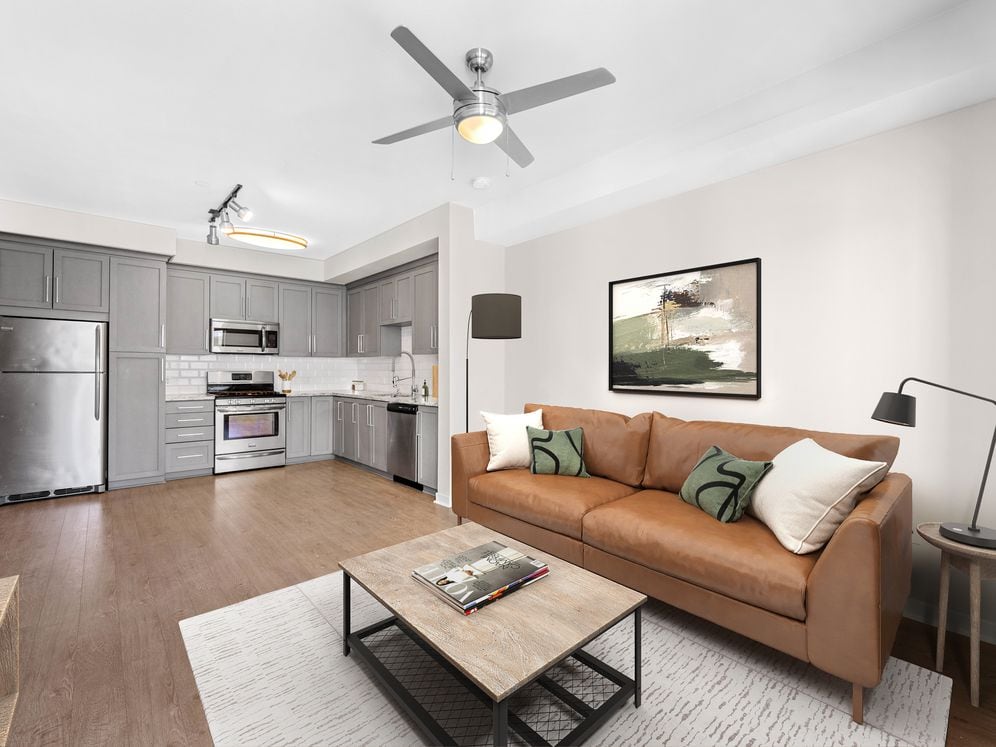 Kitchen, living, and dining area with hard surface flooring