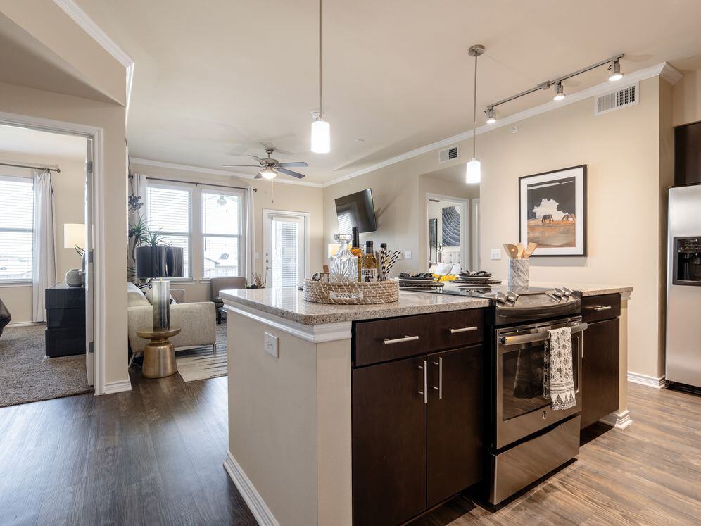 Kitchen and living room with hard surface flooring