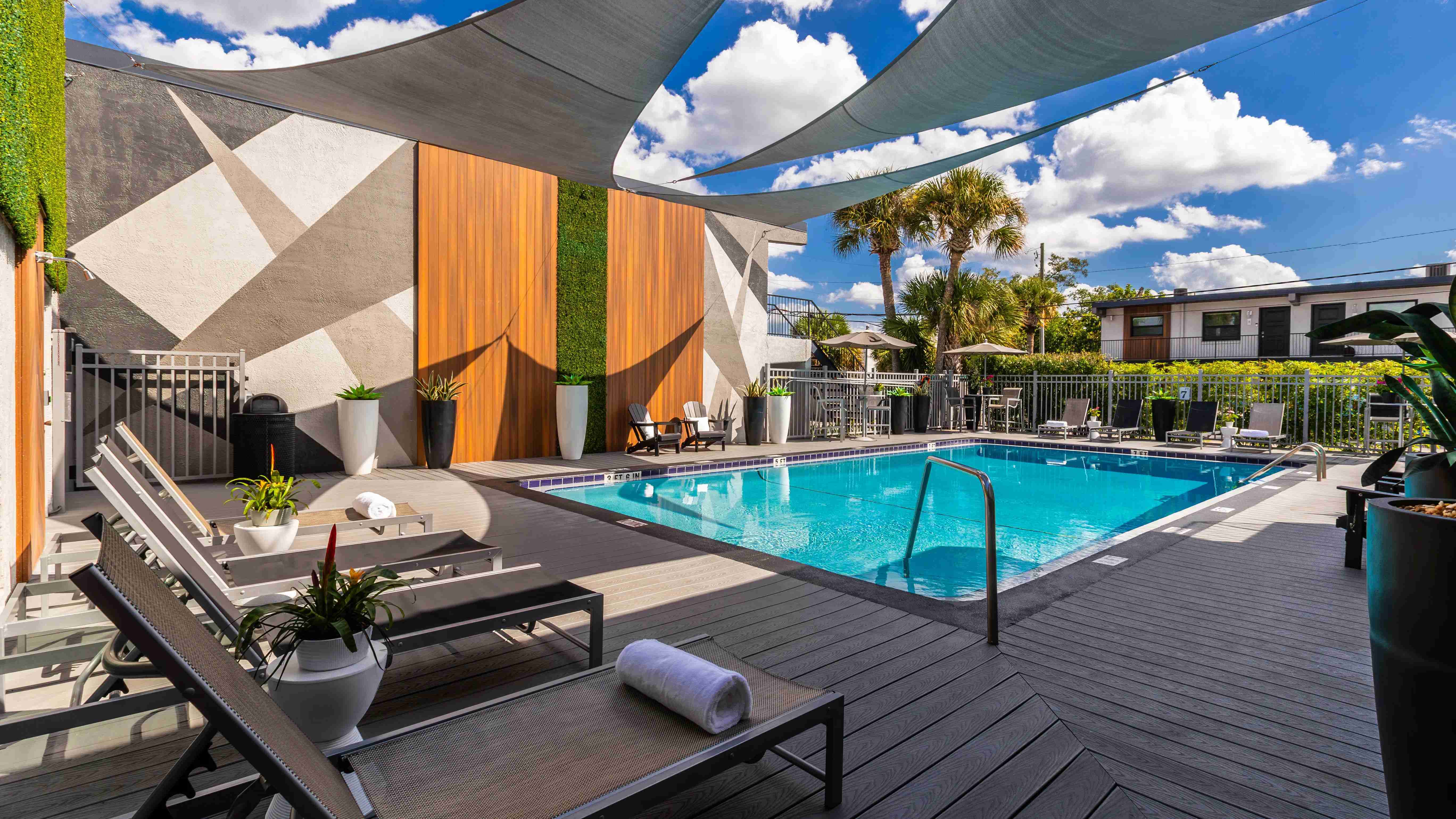 With a modern design, shaded areas, and serene surroundings, these comfortable loungers offer the perfect spot for relaxation under the Florida sun.