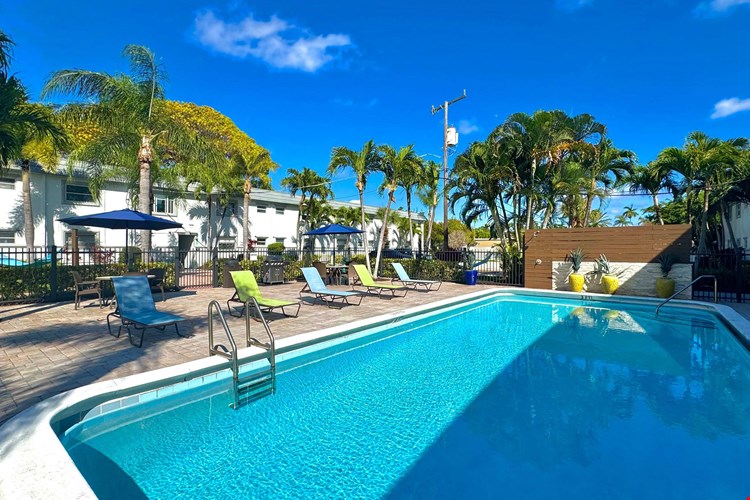 Soak up the Florida sunshine at our sparkling swimming pool.