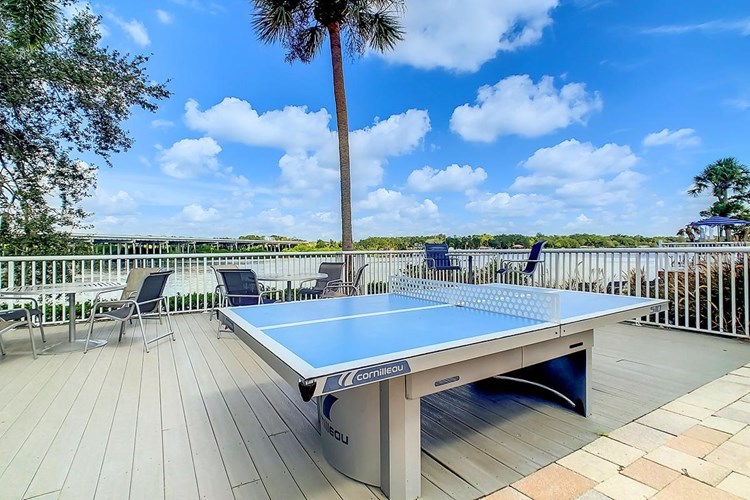 Play a game of ping pong while overlooking the beautiful lake.