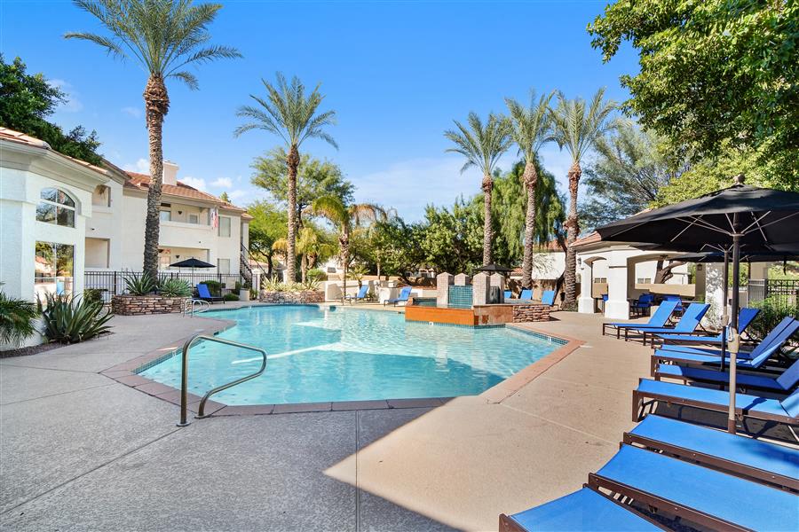 Swimming Pool with Umbrella and Pool Furniture