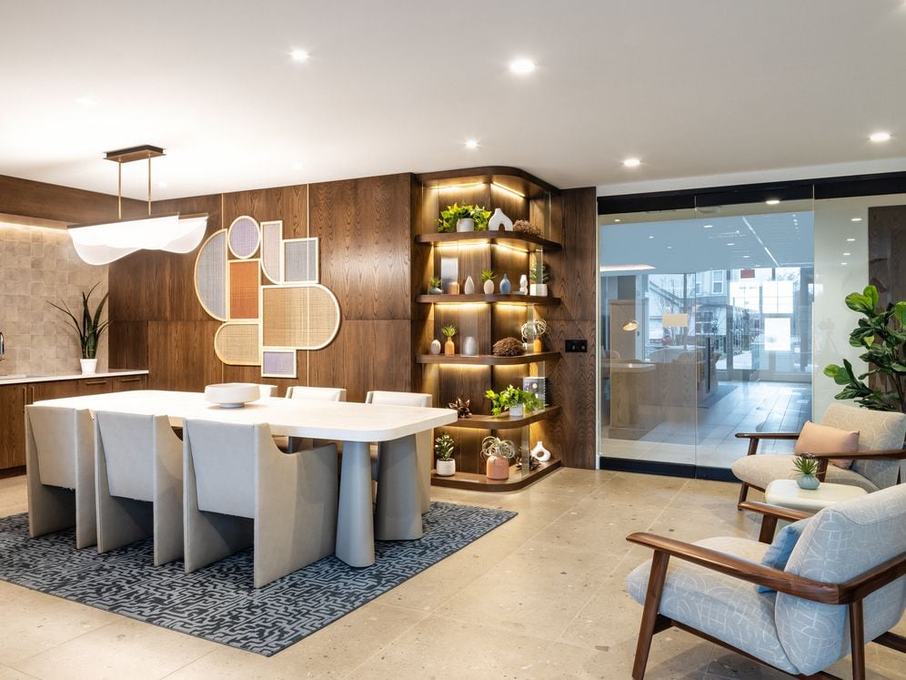 Lounge with kitchenette and seating areas