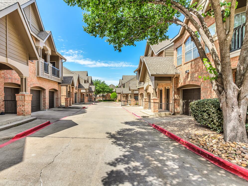 Attached garages with every apartment, building exterior
