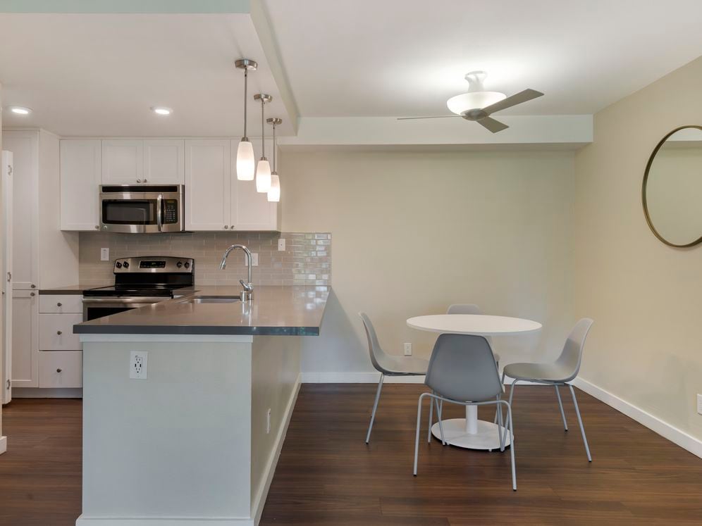 Furnished+ apartment homes include a dining set (Representative Image – exact items and style of furnishings may vary)