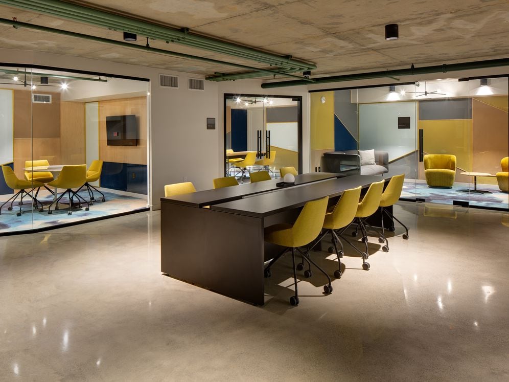 Chill lounge with common area seating and breakout rooms