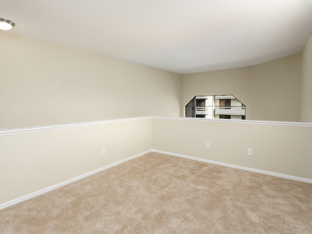 Loft area with carpet