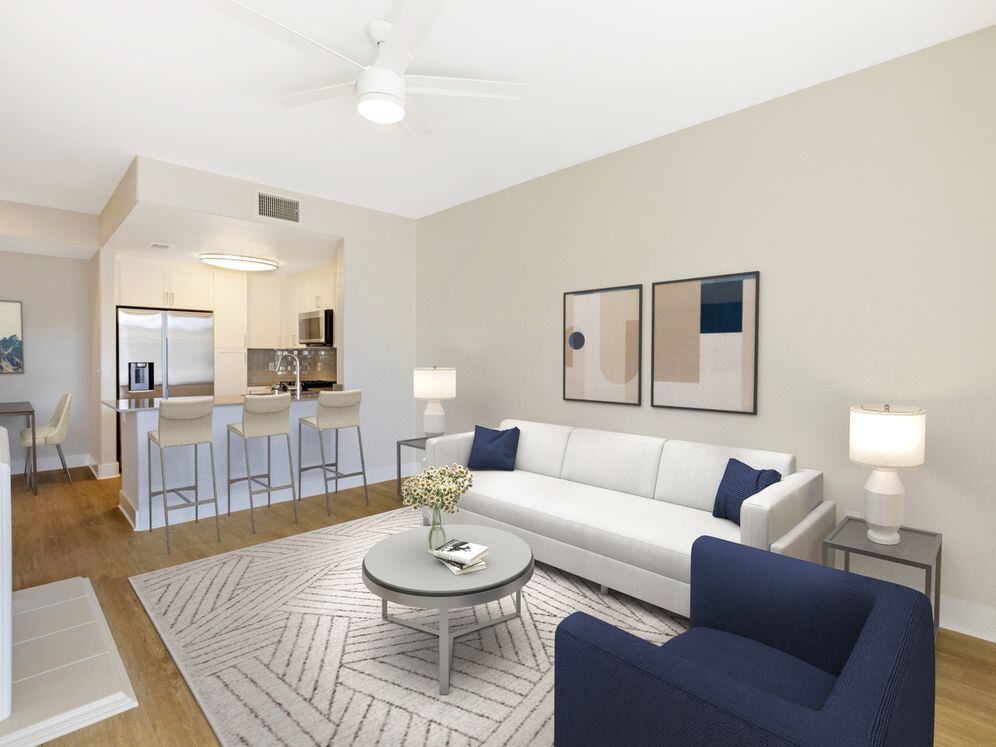 Renovated Package I living room with hard surface flooring