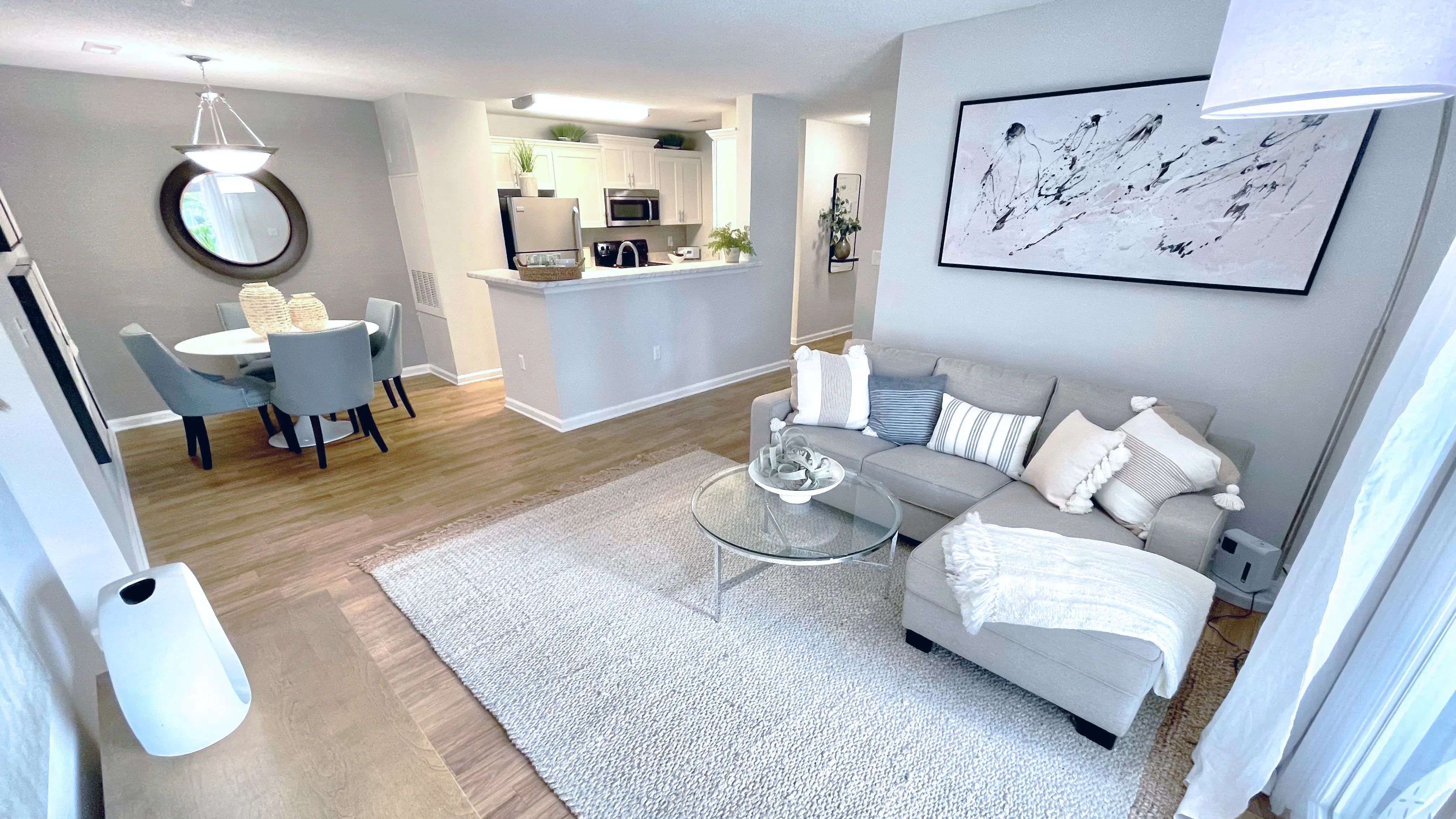Experience the beauty of open concept living at Emerson Isles, where your living room seamlessly connects to the dining and kitchen areas. A space designed for both style and sociability!