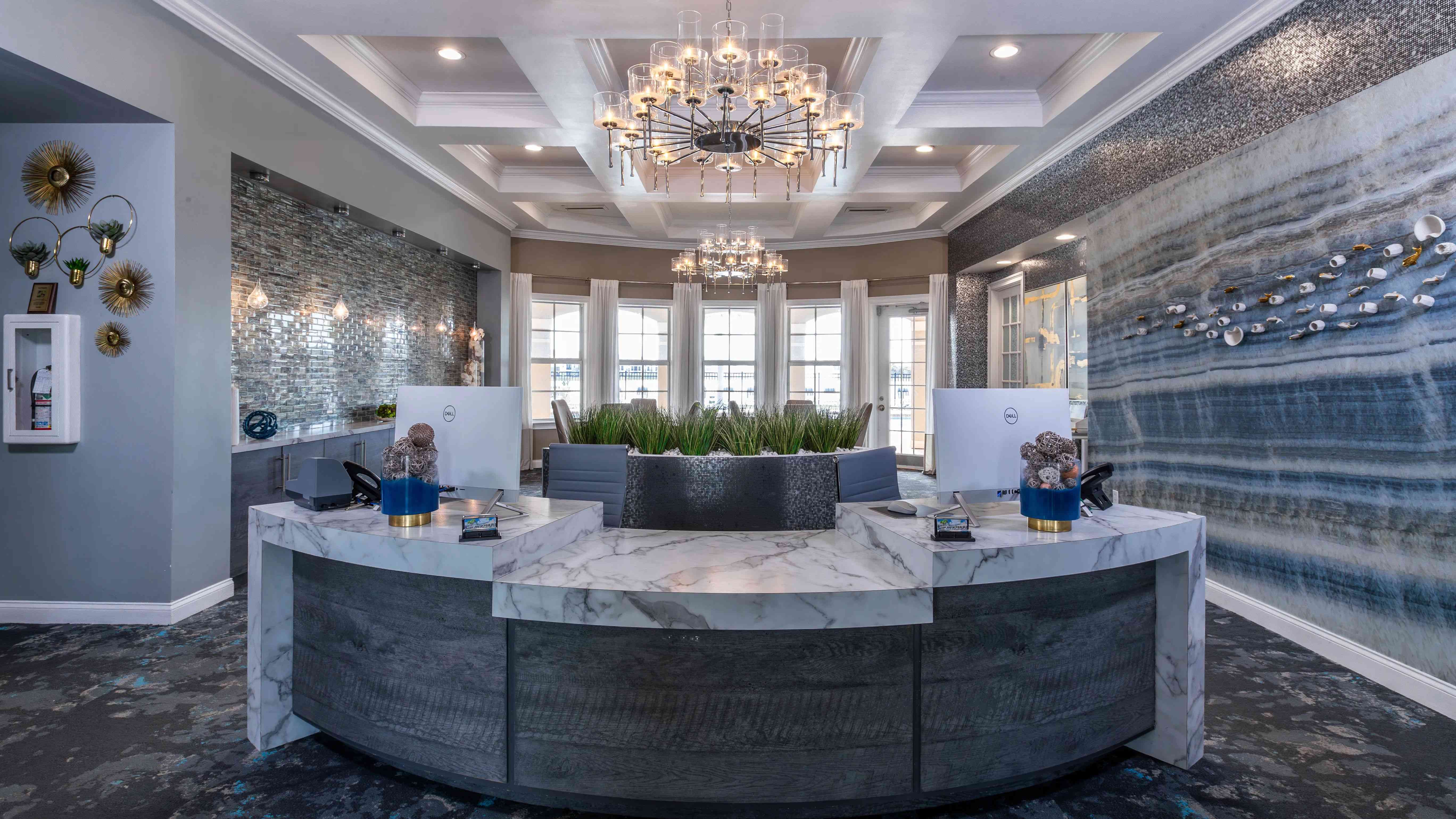 Step into sophistication with our beautifully designed leasing office featuring modern décor and elegant lighting.