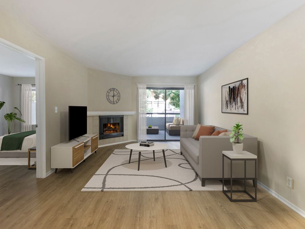 Renovated Package I living room with hard surface flooring