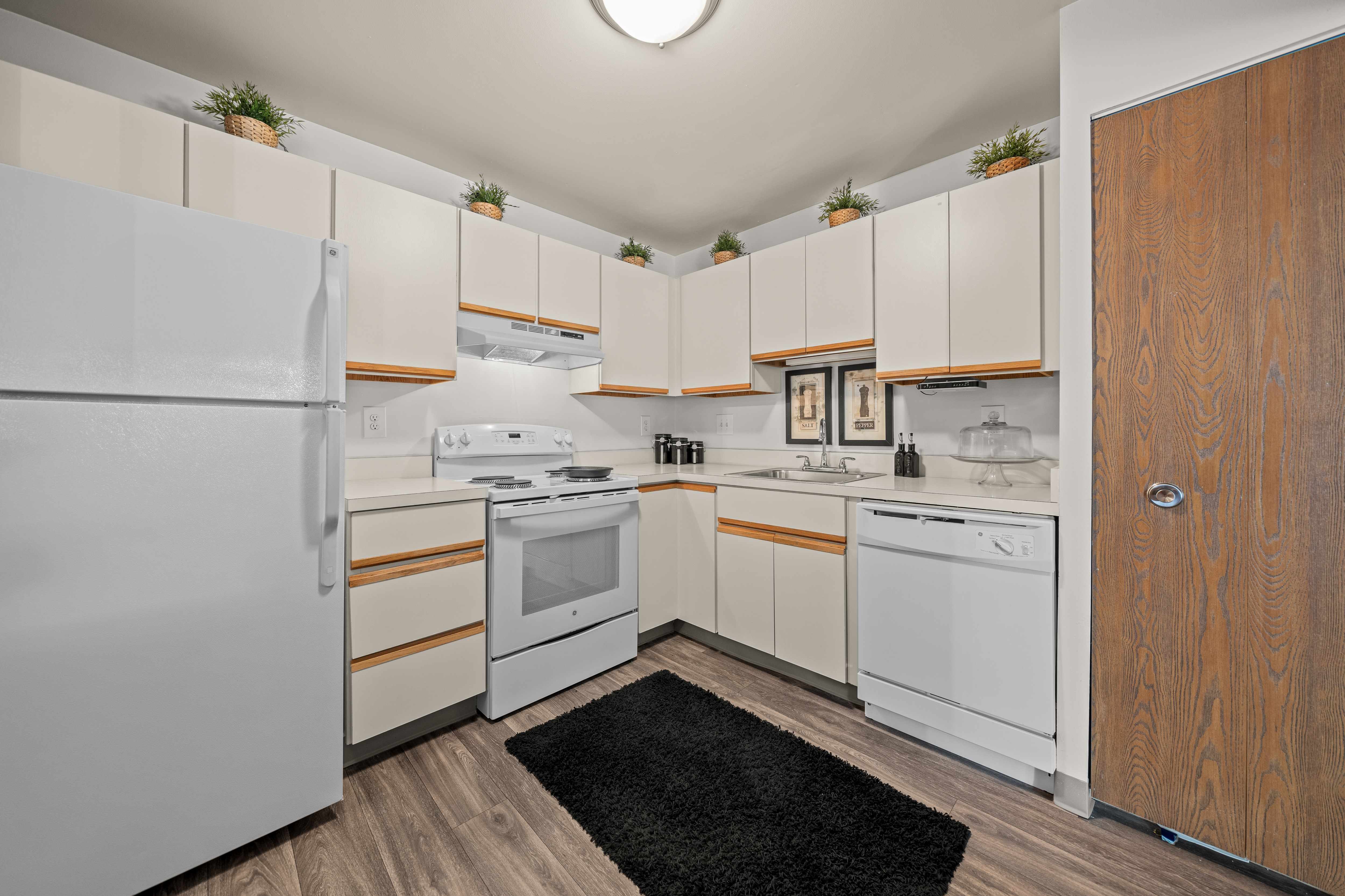 Spacious kitchen with white appliances at Park Lane Apartments in Southfield