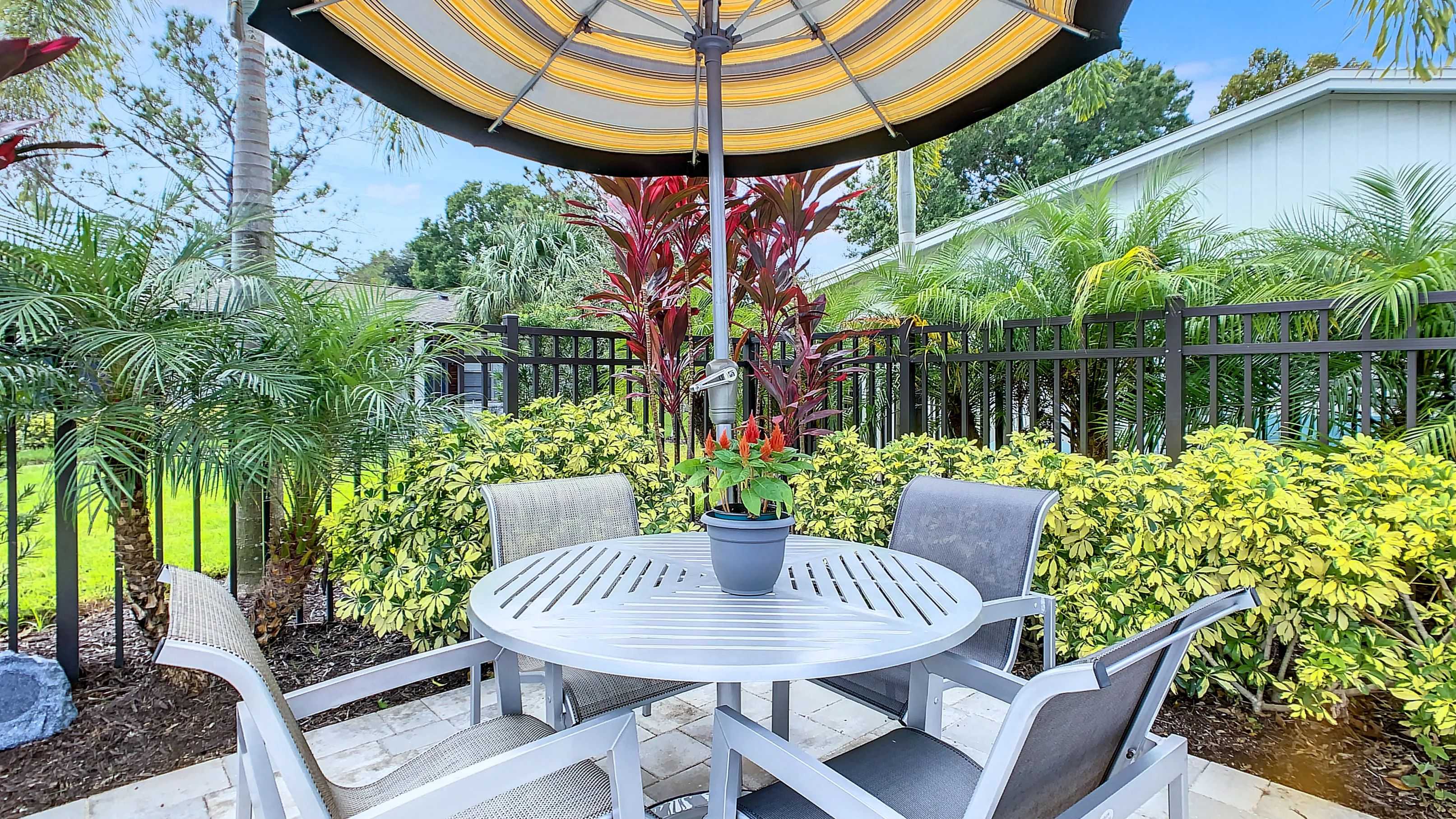 Enjoy lunch by the pool at our poolside tables with umbrellas. 