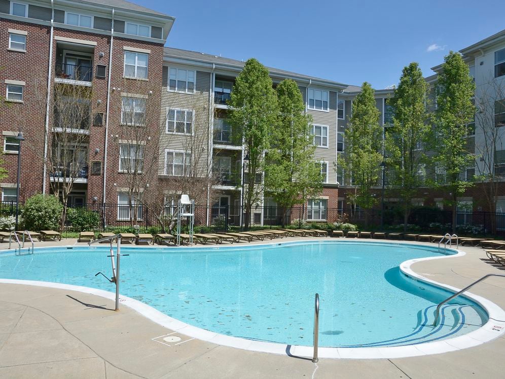 Swimming pool and sundeck with lounge seating