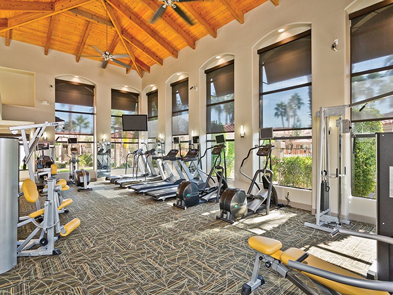 24-hour fitness center with TVs on all cardio equipment