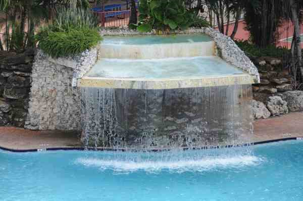 Tropical waterfall swimming pool