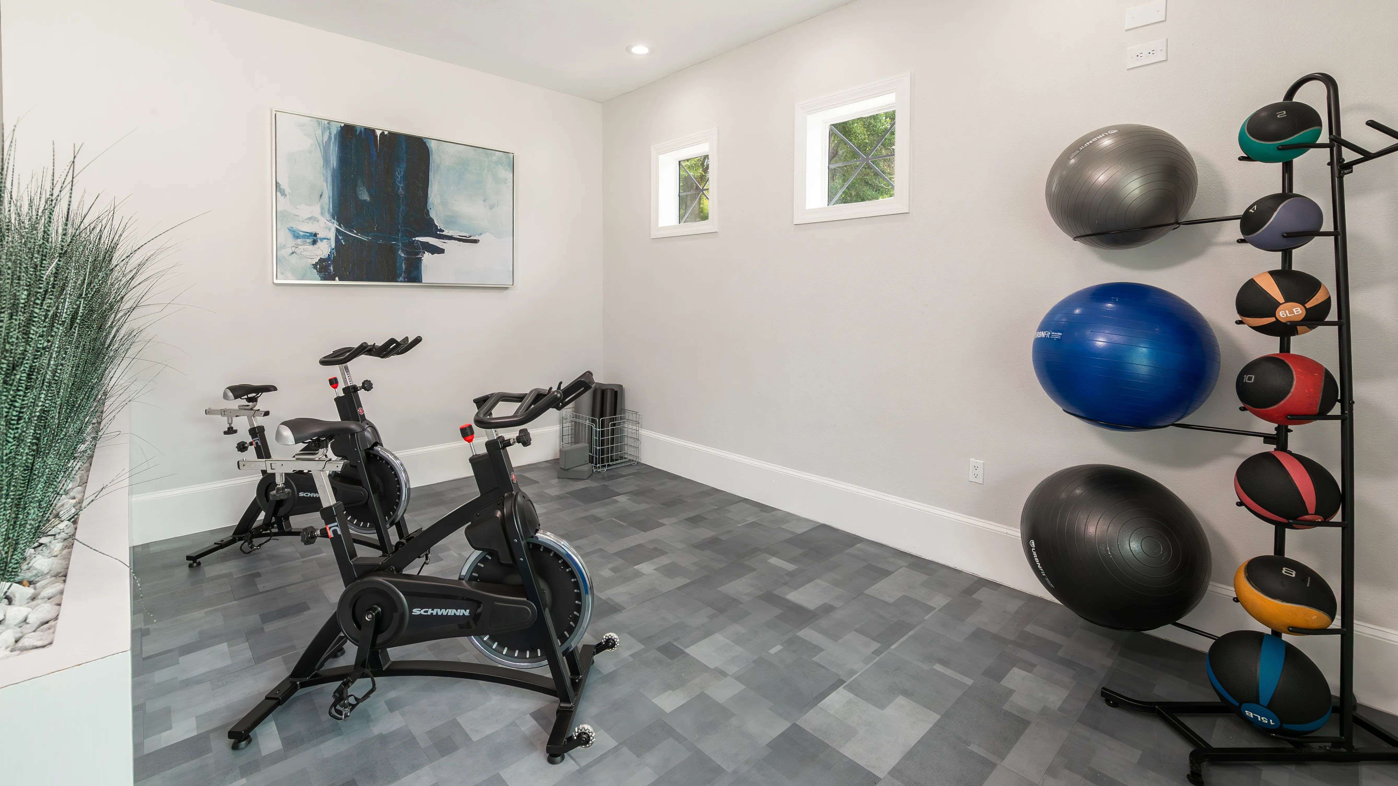 Our fitness center also features a spin studio. Whether you're crushing a spin session or winding down with a stretch, this sleek wellness space supports your every move.