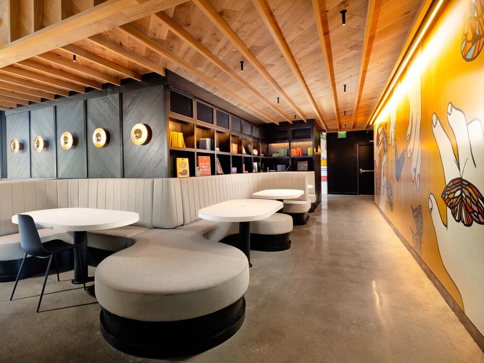 Lobby lounge with multiple seating areas and work-from-home spaces