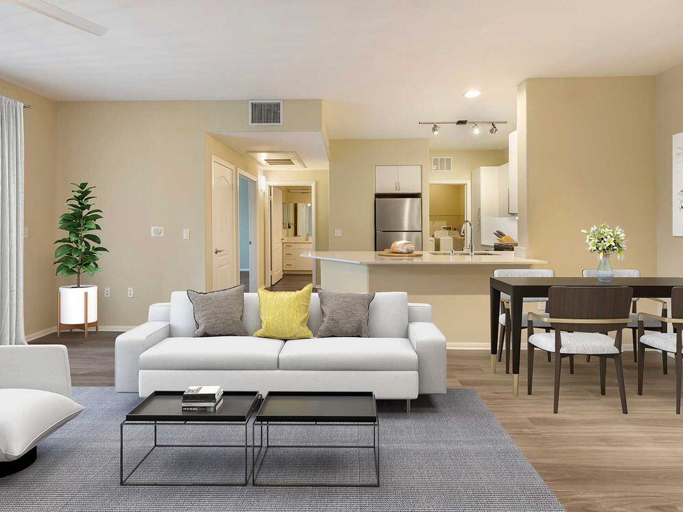 Renovated Package I kitchen, living, and dining areas with hard surface flooring