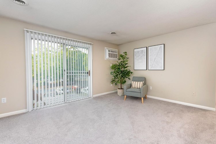 Living rooms feature sliding doors to your very own private balcony in select homes.