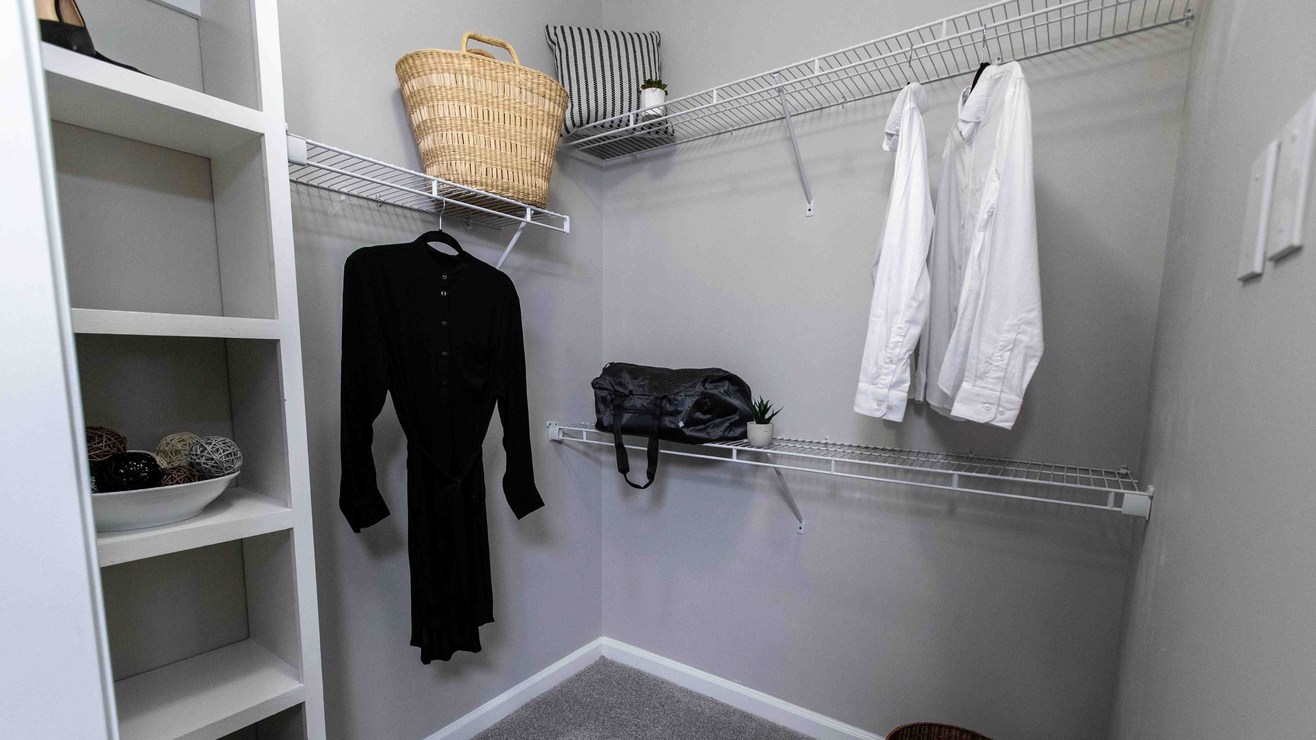 Effortlessly organize with custom shelving in our oversized walk-in closets - tailored with you in mind! 
