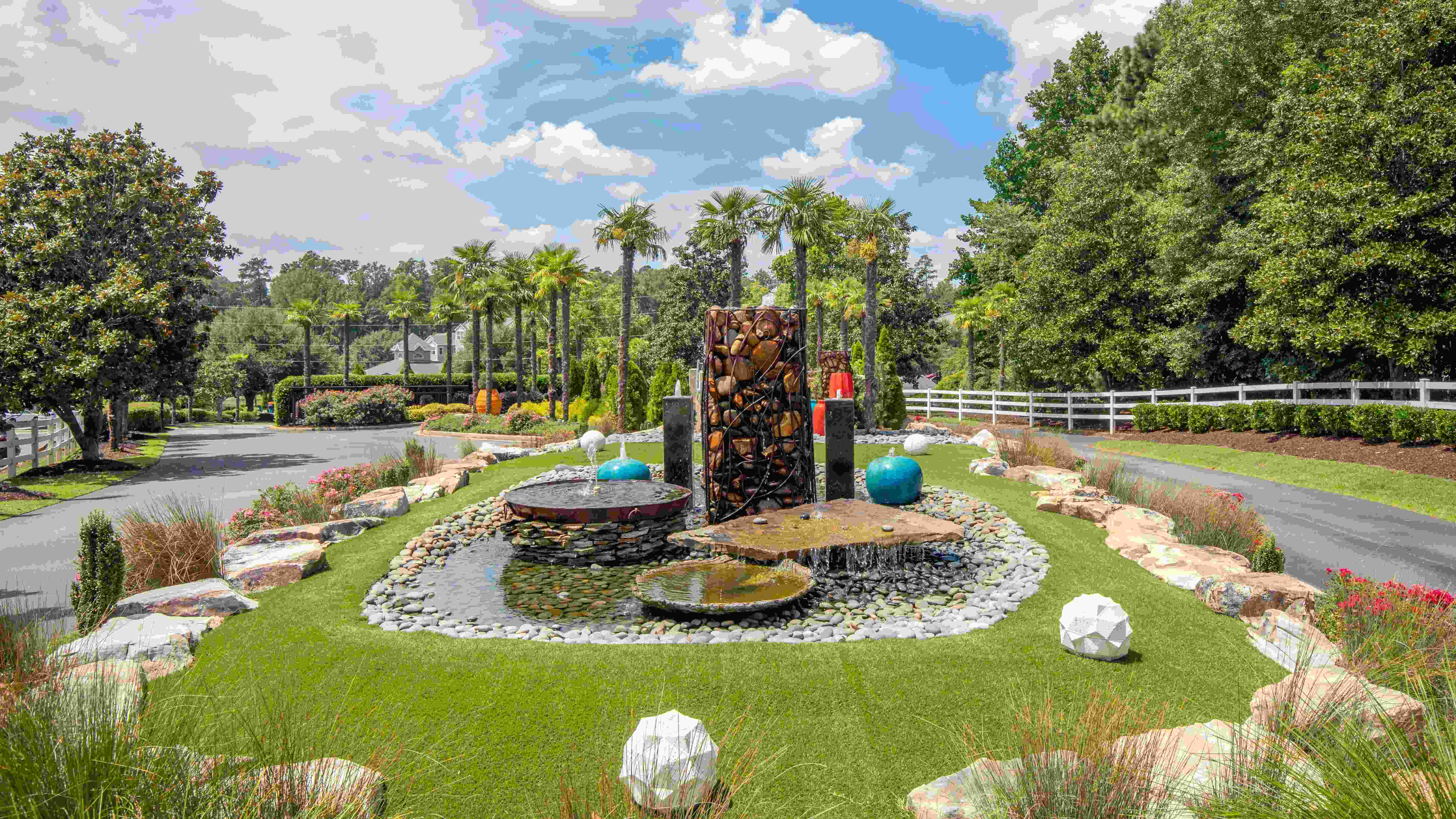 Immerse yourself in the tranquil beauty of our feature fountain, where elegance and grandeur meet. 