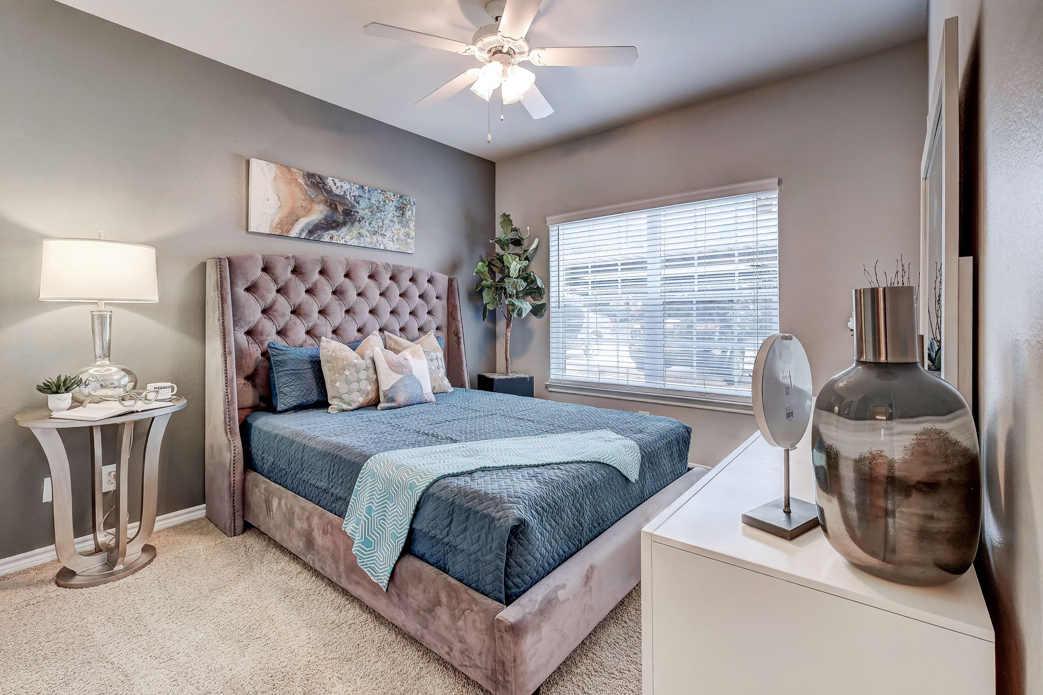 Stunning Master Bedroom with plush carpet and ceiling fans