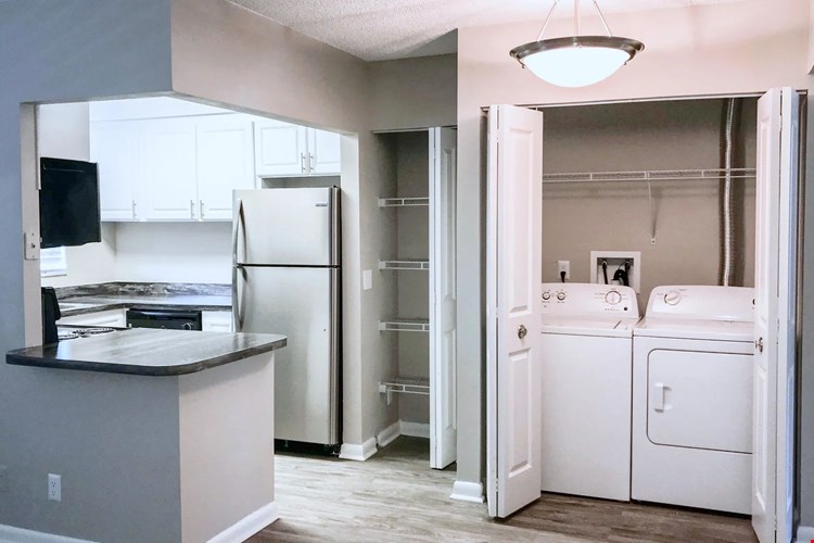 We also offer renovated kitchens, featuring black fusion granite-like countertops, wood-style flooring, stainless steel appliances, and spacious white cabinetry to meet all your culinary needs.