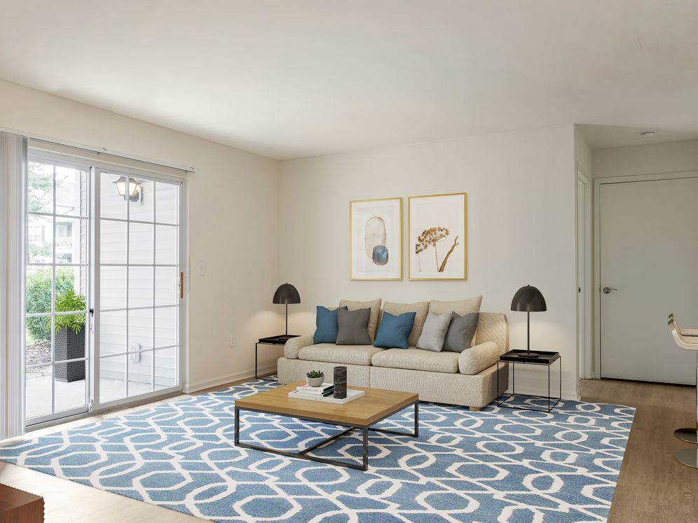 Renovated Package I living area with hard surface flooring