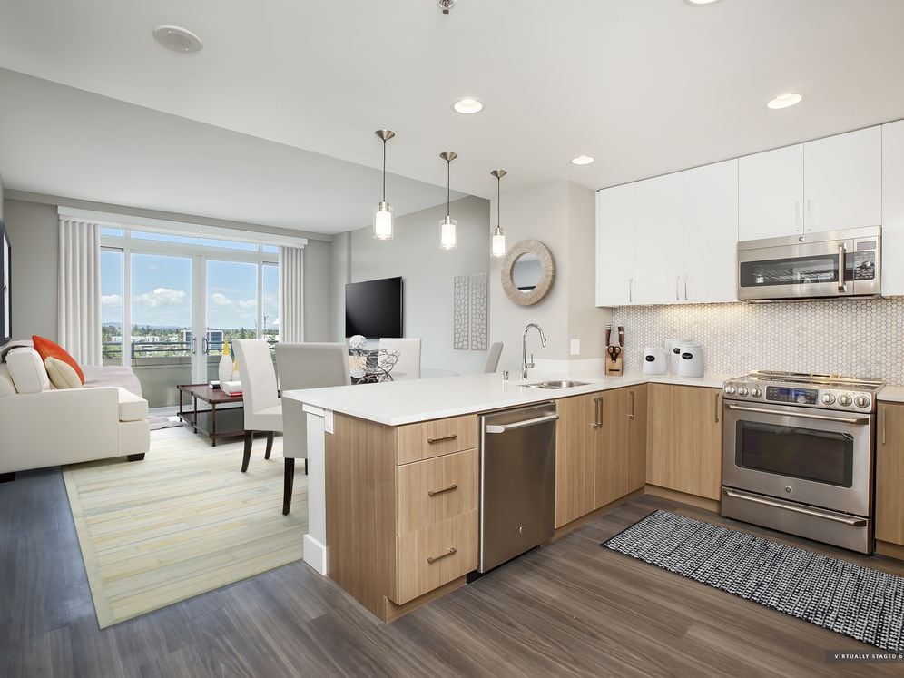 Signature Collection Kitchen Living and Dining Area with Hard Surface Vinyl Plank Flooring