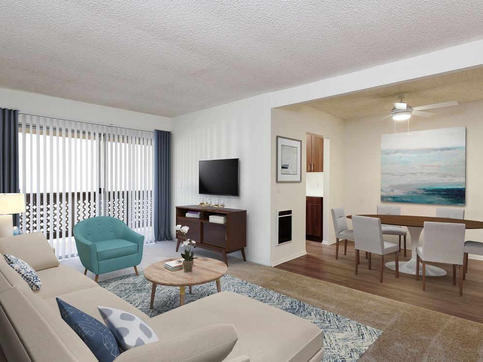 Renovated I kitchen and dining area with hard surface flooring and carpeted living area