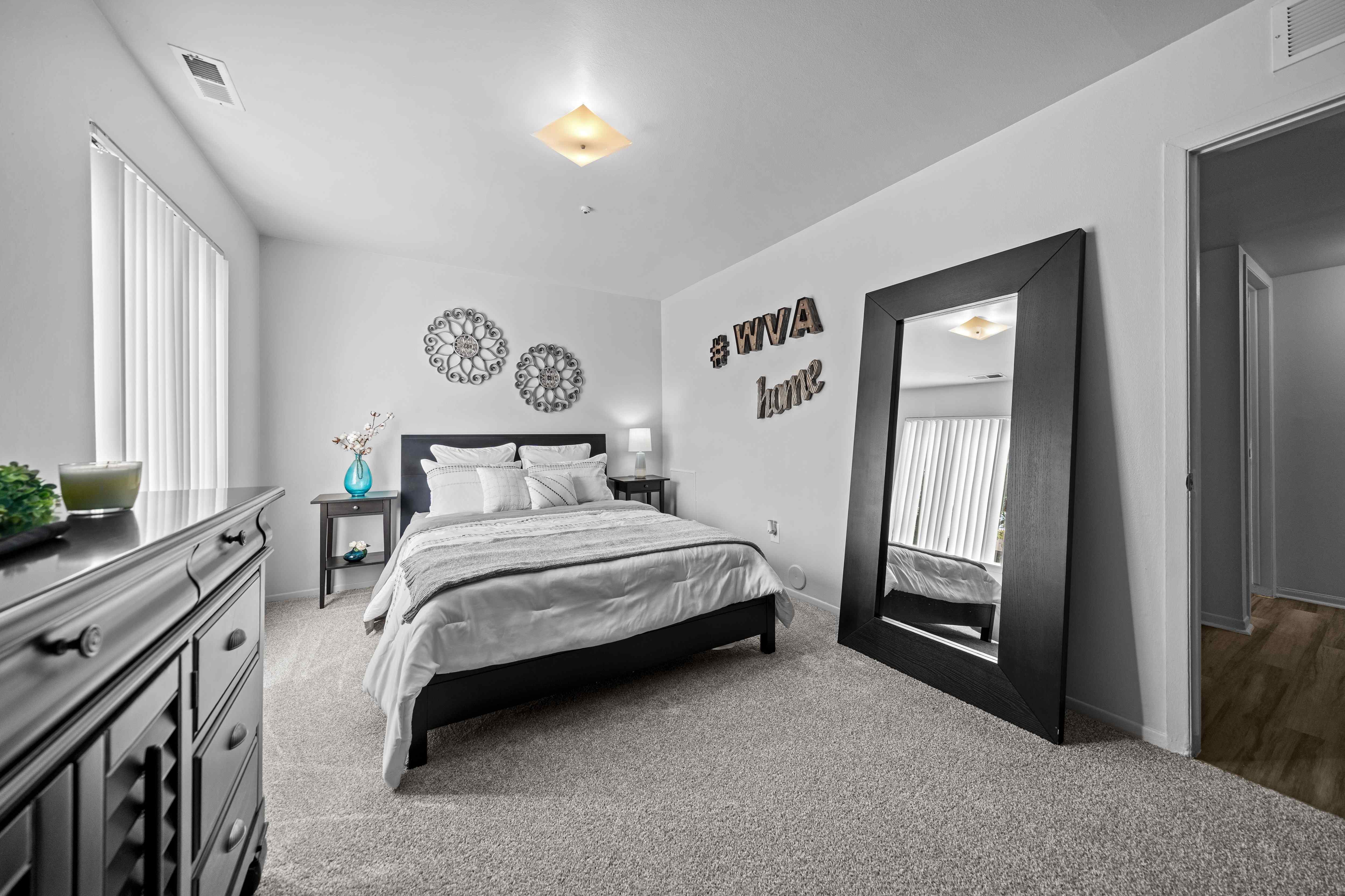 Big bedroom with natural lighting at Westwood Village Apartments in Westland, MI