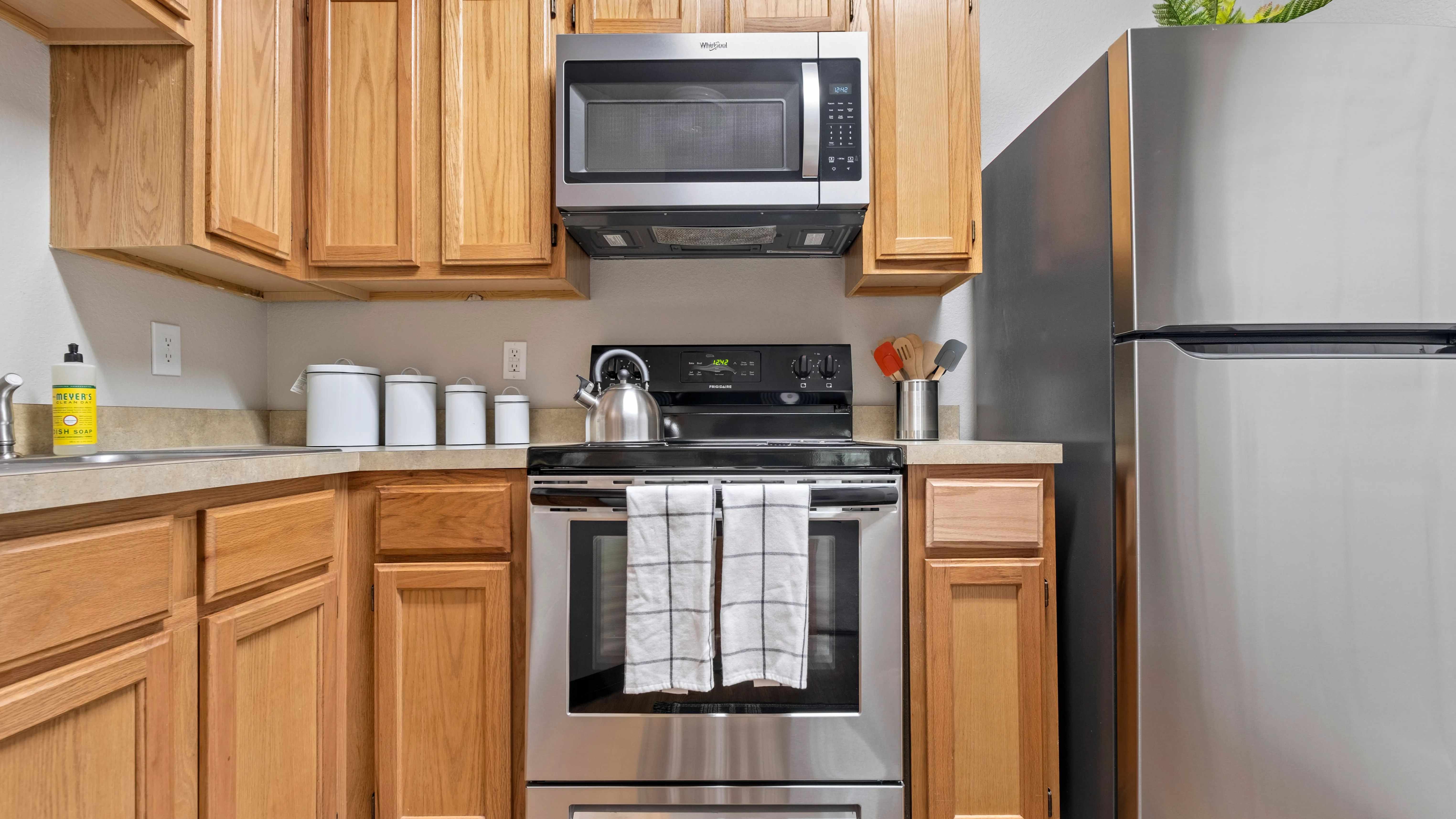 Unleash your inner chef in this fully-appointed kitchen. A symphony of appliances awaits your culinary masterpiece.